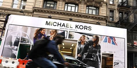 what company did michael kors buy|michael kors parent company.